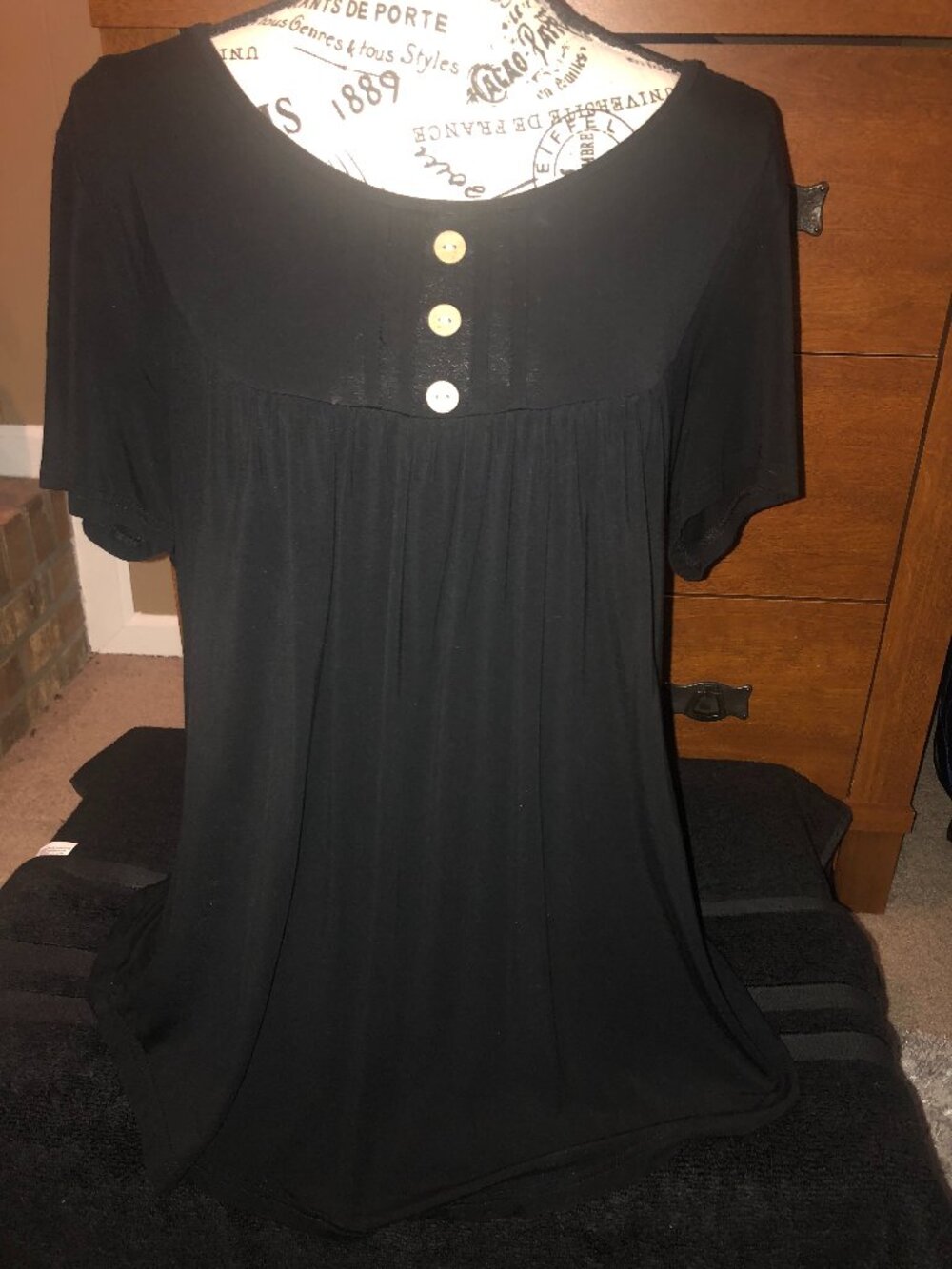 woman's black flowing blouse size large